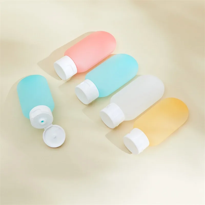 COD AR18 Botol Refill Mini Lotion Sabun Macaron Travelling Botol Sabun Shampoo Cair Isi 60 Ml Botol Refill Plastik Fliptop Tempat Isi Ulang Portable